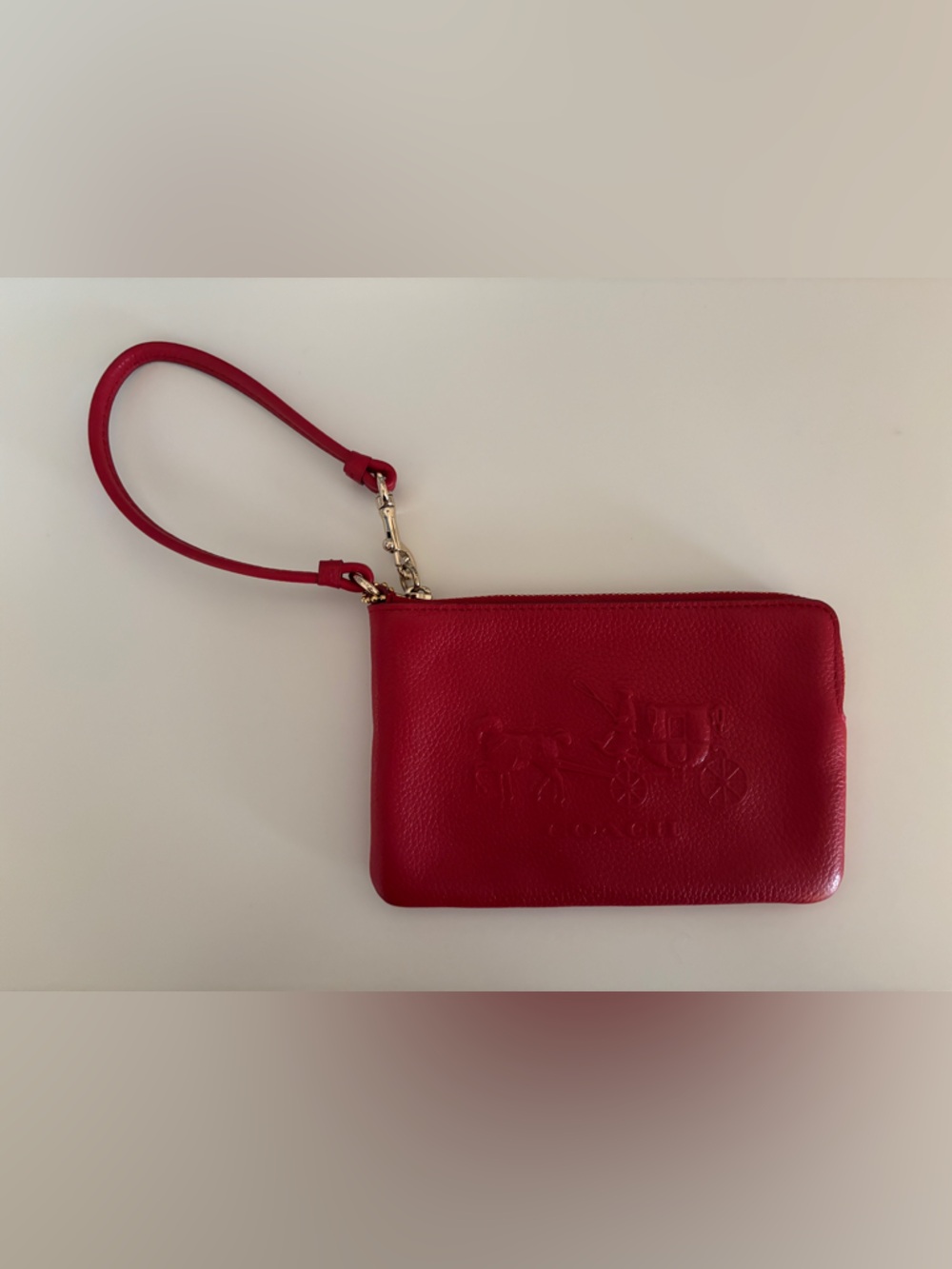 Bright Red Leather Coach Wristlet with Embossed Logo